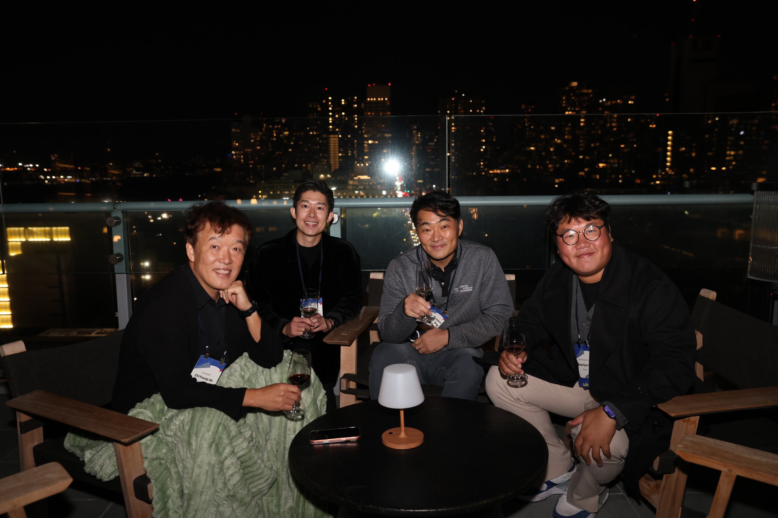 Founders networking at an evening dinner event