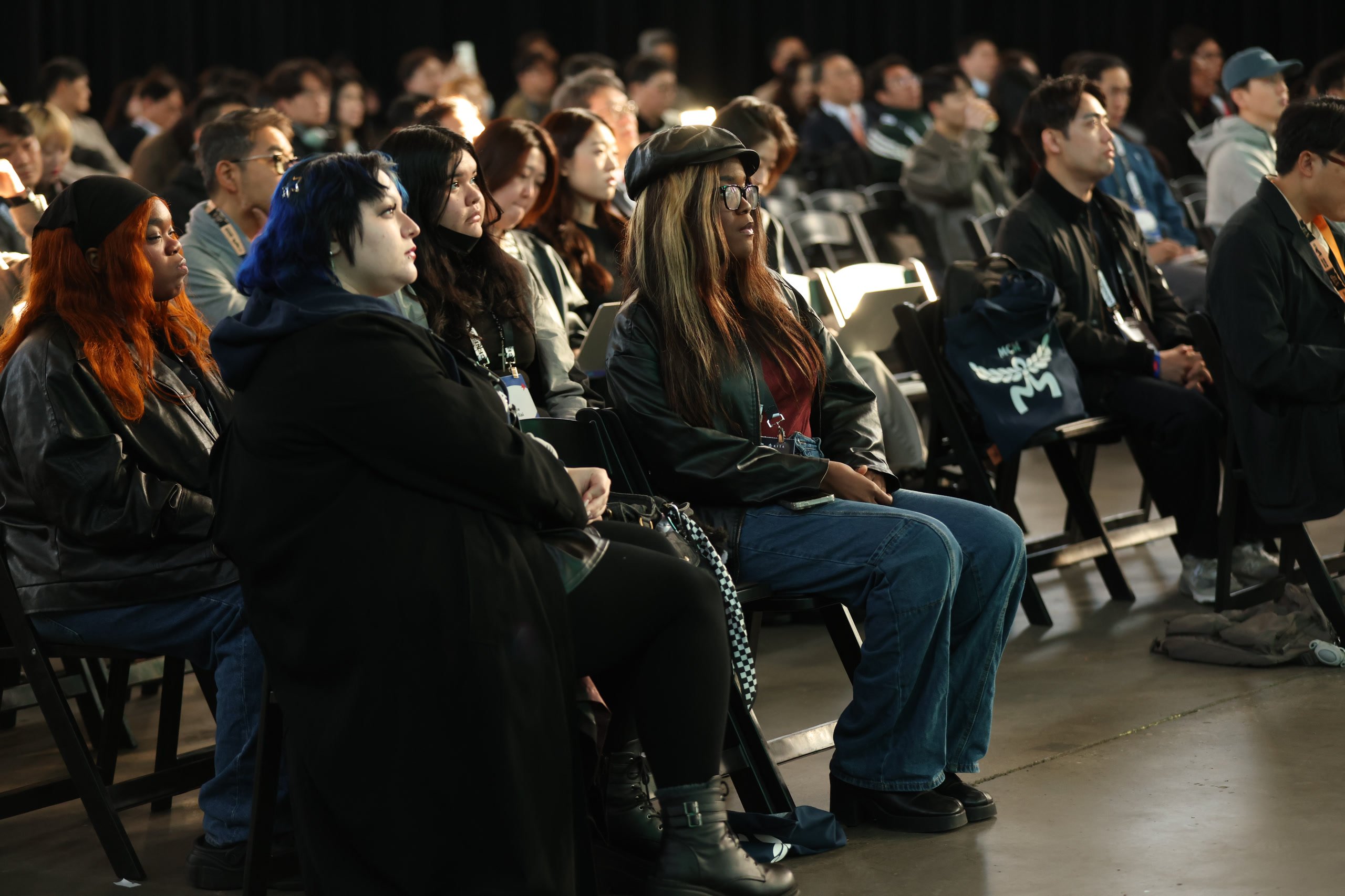 Audience at a KOOM conference session